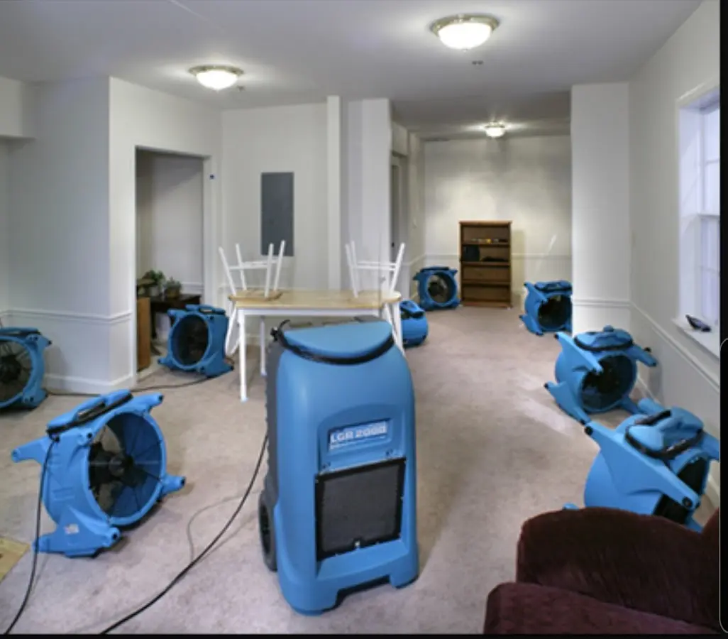 Air movers and dehumidifier setup for Water Damage Restoration in Avon